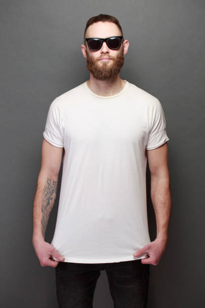 istock Hipster handsome male model with beard wearing white blank t-shirt 925285174