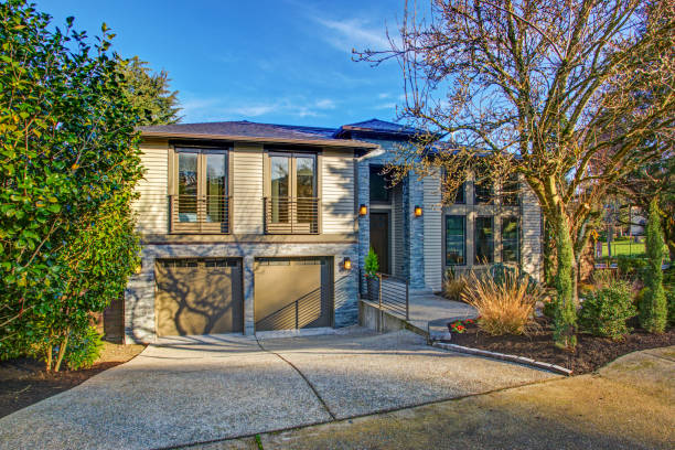 New construction home exterior with elegant stone porch