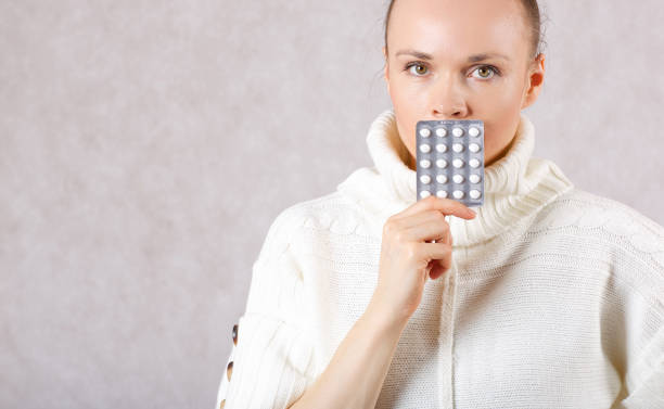 istock Young caucasian lady shows some medication. 925288212