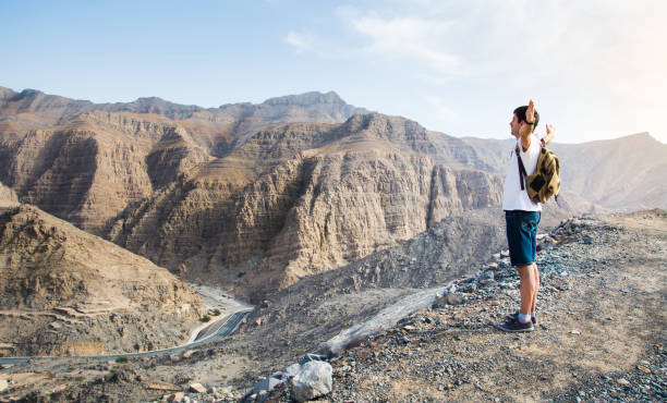 istock Male hiker enjoying the mountain view 925288468