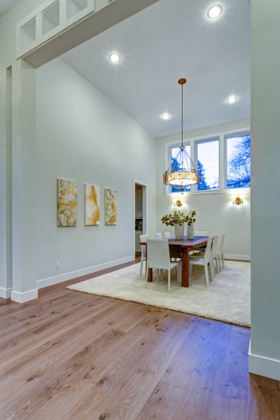 istock New custom built home boasts spacious dining area with high ceiling 925289440