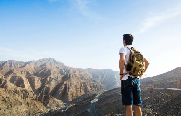 istock Male hiker enjoying the mountain view 925295894