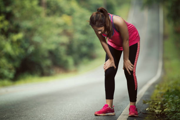 Women are tired From jogging on a steep slope Women are tired From jogging on a steep slope hot women working out pictures stock pictures, royalty-free photos & images