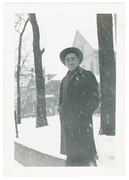 istock Young Asian Man in the Snow 92530327