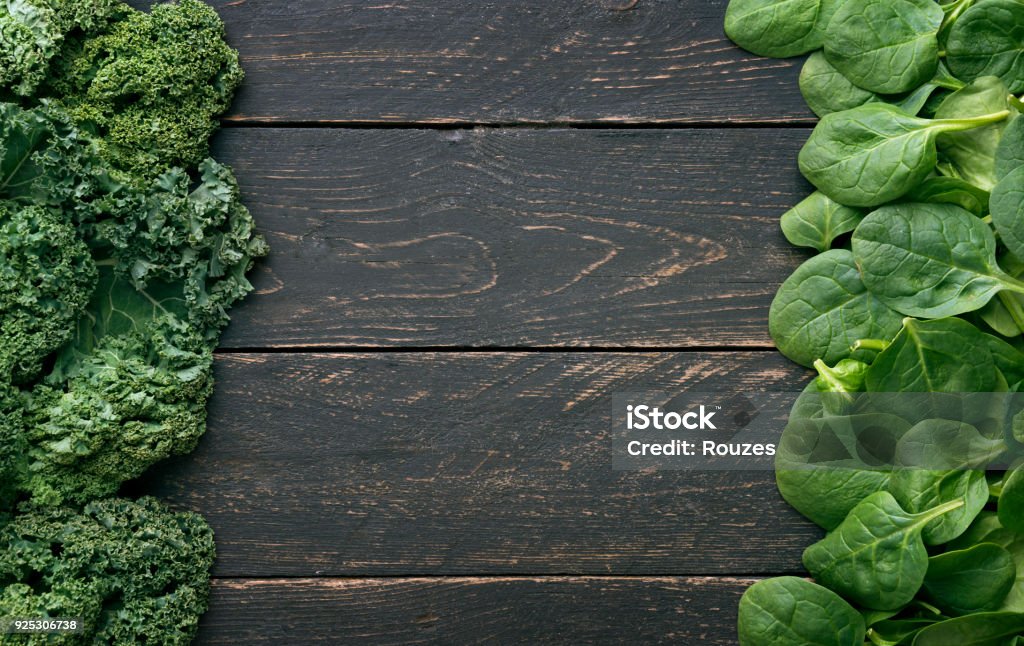 Leaves of raw kaleand spinach, above view Healthy Eating background Spinach Stock Photo