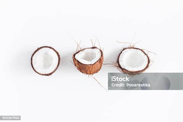 Fresh Coconuts On White Background Flat Lay Top View Stock Photo - Download Image Now