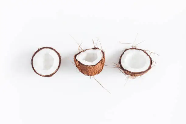 Coconut background. Fresh coconuts on white background. Flat lay, top view