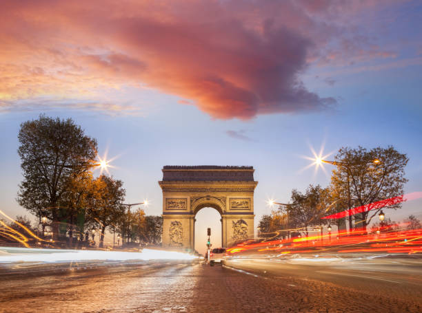 istock Arc de Triumph at night in Paris, France 925308882