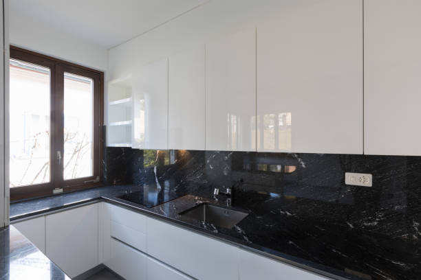 istock Details of white and black kitchen, marble detail 925314852