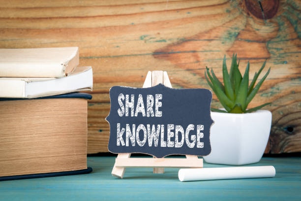 istock Share knowledge. small wooden board with chalk on the table 925315108