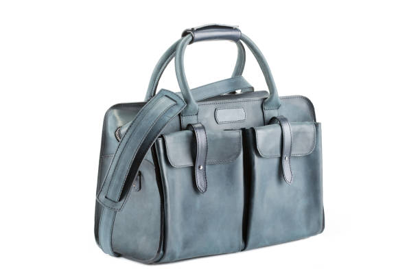 istock leather soft travel bag of medium size on a white background 925315214