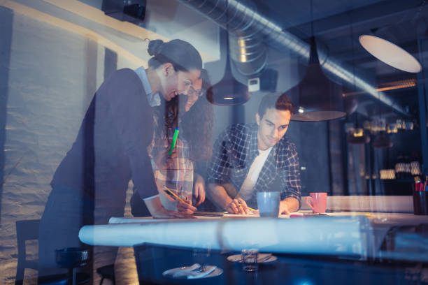istock Group of young architects working together in architecture studio 925318898