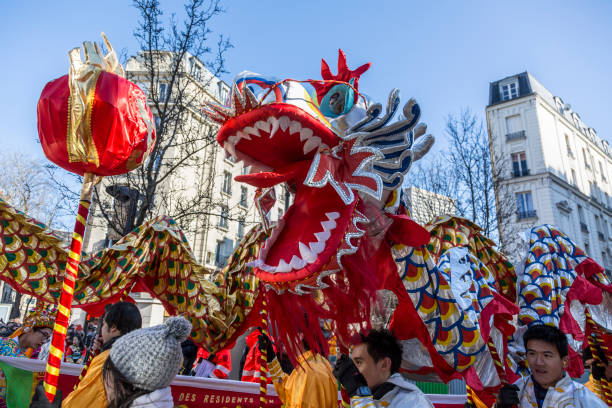 Paris,France-February 25,2018: Detail of the traditional Chinese Dragon performing in the street during the 2018 Chinese New Year parade in Paris.