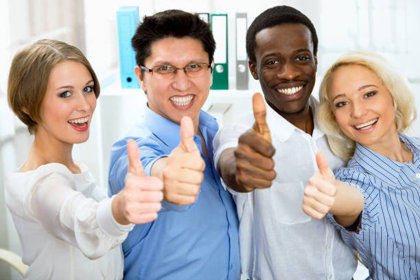 istock Business people with thumbs up 925323598