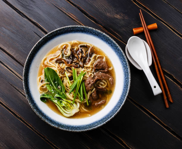 istock Ramen asian noodle in broth with Beef and pak choi cabbage 925331112