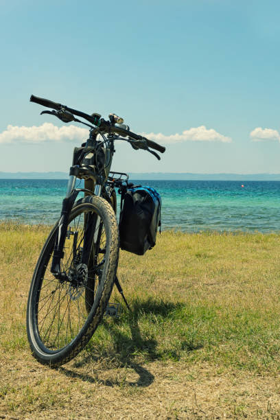 istock Bicycle parked on the sea coast 925335752