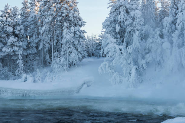 istock winter in Lapland, Sweden, Norrbotten, waterfall 925341080