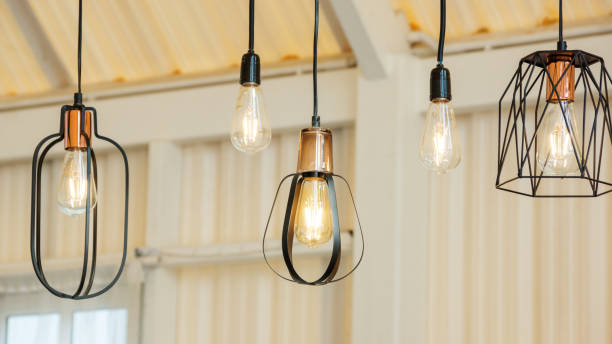 istock Close up of the lamp hanging from a ceiling. 925343856