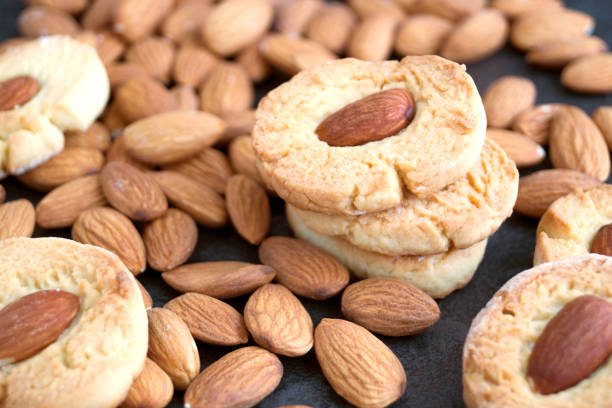 istock Homemade cookies with almonds on a dark background. 925344940