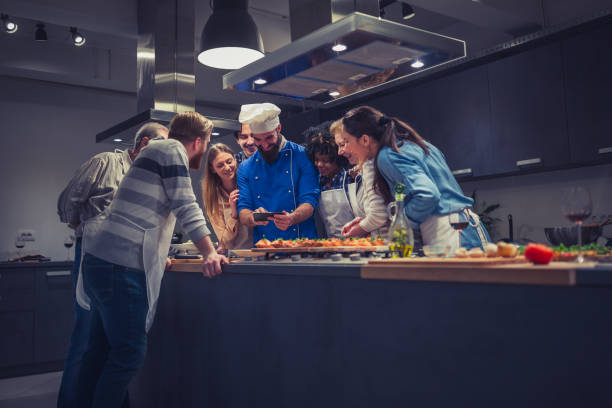 istock Cooking class participants having fun, enjoying their time 925345574