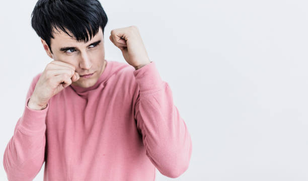 istock smart and handsome caucasian man prepare to fight with white background 925349866