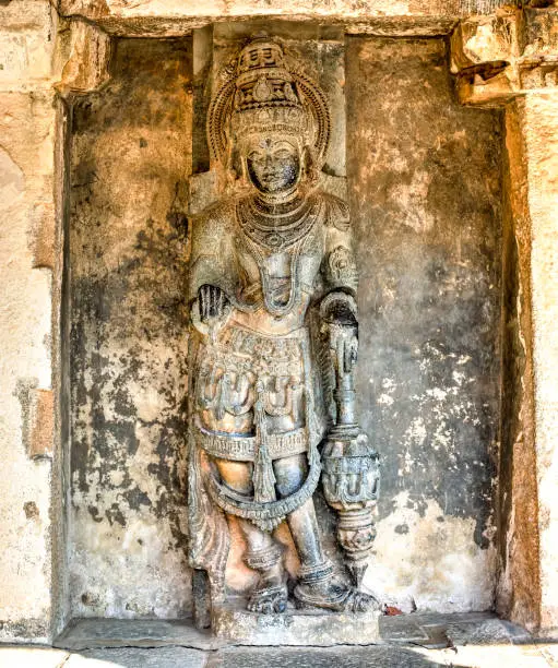 Hindu sculpture depicting Jaya, a demigod who was the gatekeepers of the Vishnu abode, known as Vaikuntha, place of eternal bliss inside of Chennakeshava Complex, Bellur, India