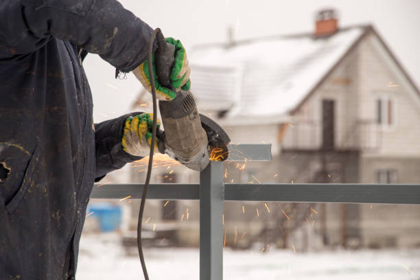 istock The worker cuts the metal with sparks 925360992