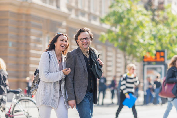 istock Couple crossing the street 925369942