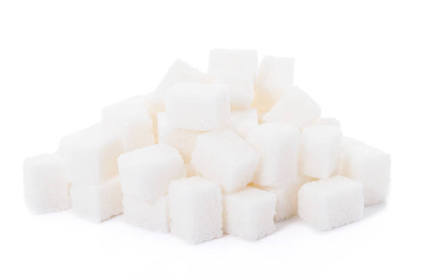 istock Group of sugar cubes isolated on white background 925370022