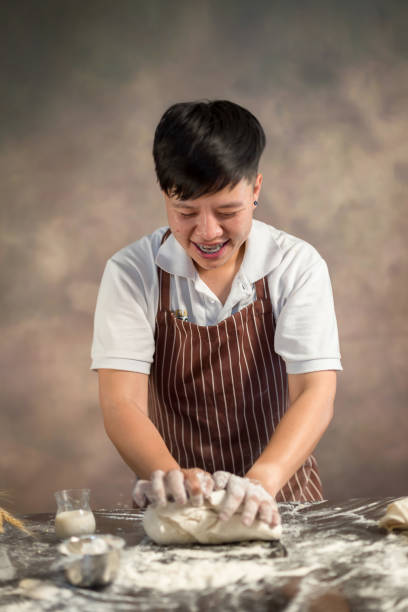 istock Chef hipster stylish Hands preparing bread Raw dough for bread with ingredients 925370500
