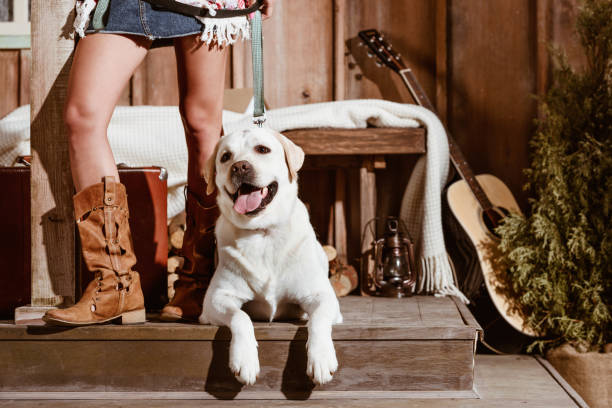 woman in boho style with dog