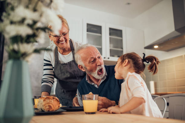 istock Grandpa always makes her laugh 925380938