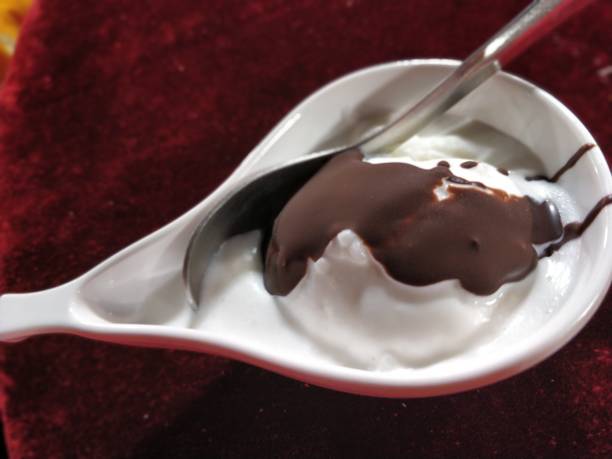 istock Fresh vanilla ice-cream with chocolate syrup 925382246