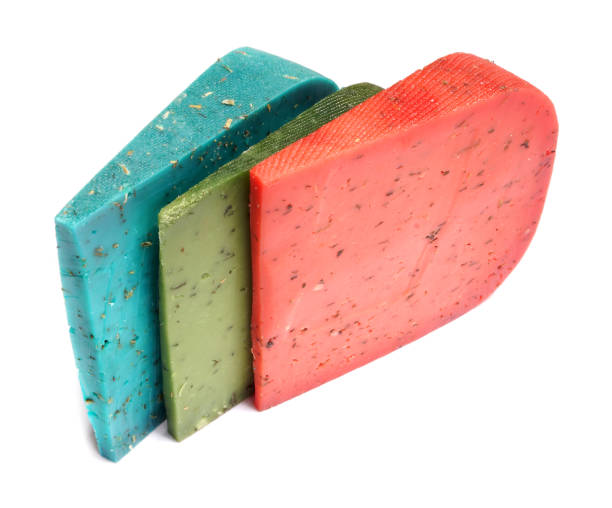 istock Dutch green, red and blue cheese. Cheese on a white background. 925384396