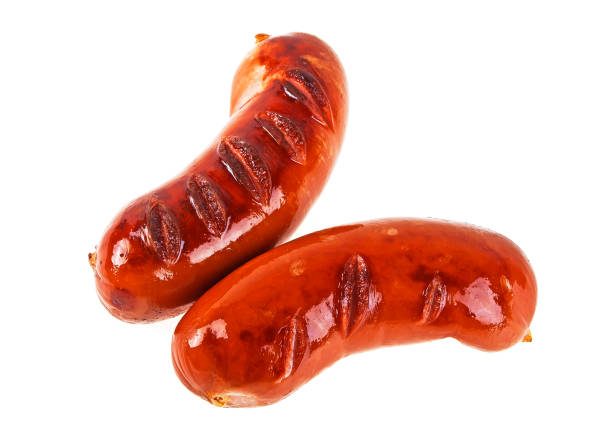 istock Two grilled sausages on a white background 925384778