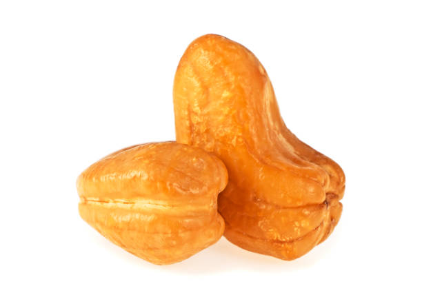 istock Roasted cashew nuts isolated on a white background 925384836