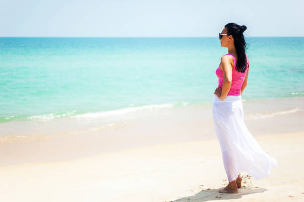 istock Happy Woman On The Beach 925391804