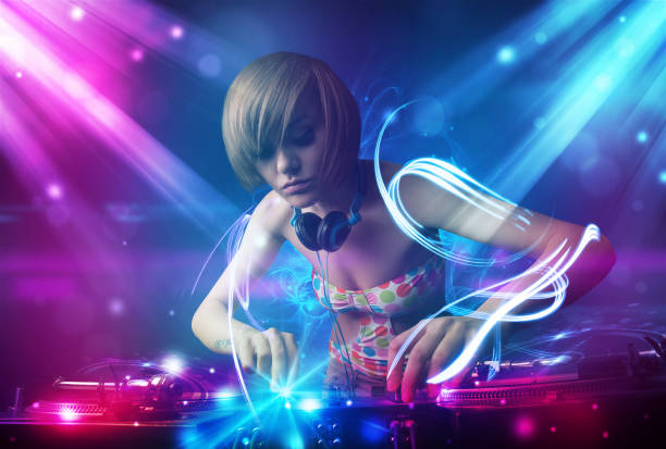 istock Energetic Dj girl mixing music with powerful light effects 925392174