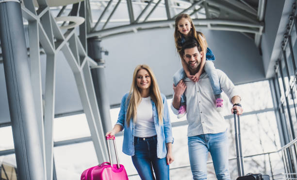 istock Family in airport 925396072