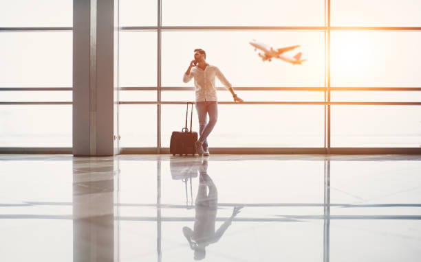 istock Handsome man in airport 925397304