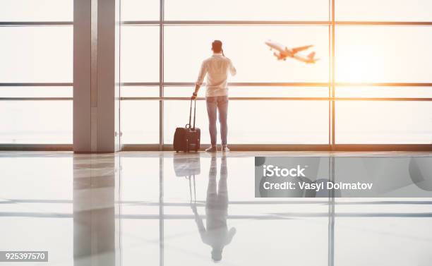 Handsome Man In Airport Stock Photo - Download Image Now - Airport, Airplane, Travel