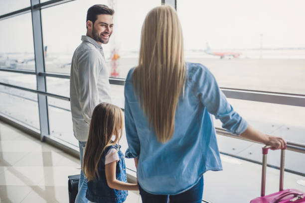 istock Family in airport 925397950