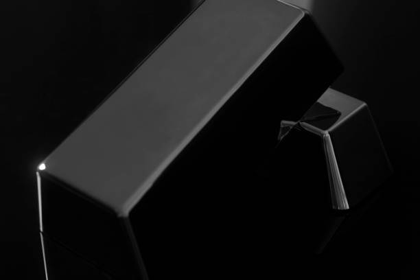 istock Silver bullion isolated on black background 925398612