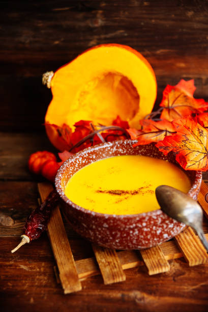 Pumpkin soup on a wooden table