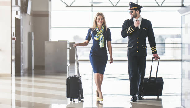 istock Pilot and flight attendant in airport 925407656