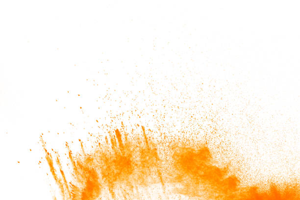 istock abstract orange dust explosion on  white background. abstract orange powder splattered on white background, Freeze motion of orange powder exploding. 925409376