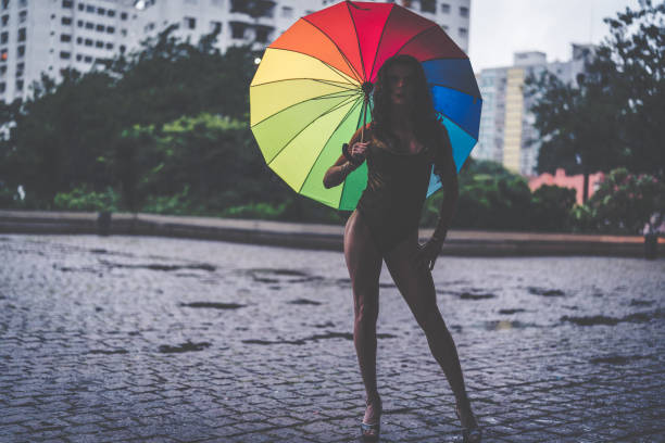 istock Fashion Drag Queen with Rainbow Umbrella 925411154