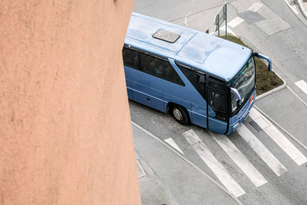 istock Bus Driving on City Streets 925413148