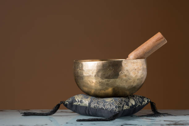 istock A singing bowl standing on a black cushion 925420994
