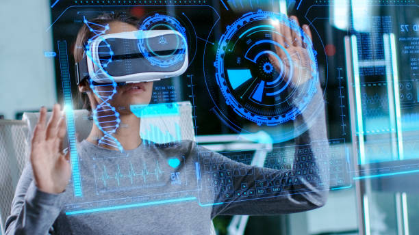 istock In Laboratory Scientist Wearing Virtual Reality Headset Sitting in a Chair Interacts with Futuristic Holografic Interface, Showing Neurological Data. Modern Brain Study/ Neurological Research Center. 925425856
